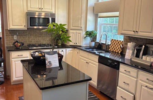 Neshannock Township House | Charming 4-bedroom house with fitness room and AC in New Castle.