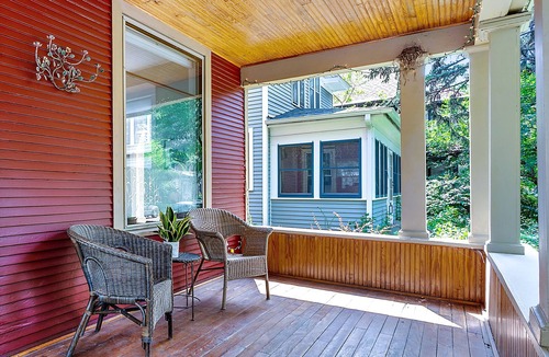 Uptown House | "Charming 4BR Home Steps to Lake of the Isles with Fenced Yard & Deck"