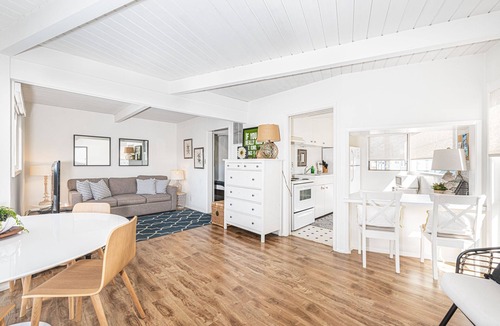 Balboa Island House | Charming 5BR Mid-Century Bayfront Retreat with Floor-to-Ceiling Windows!