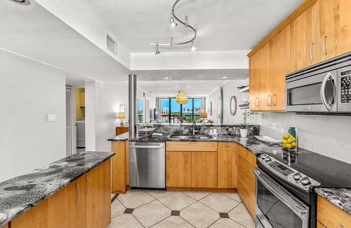 Columbiad Plaza Condo | Charming 5th floor 2-bedroom condo with views of canal, river and Port Canaveral