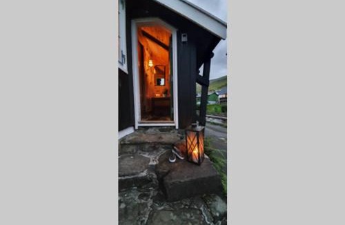 Kvivik House | Charming and Authentic Heritage Retreat in Kvívík - right next to the river