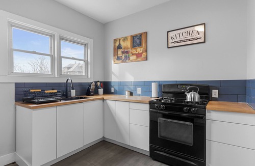 Creston Heights House | Charming and Convenient Stay on Carrier St – Perfect Location for Your Trip!