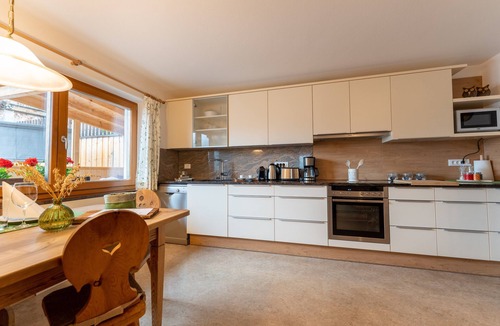 Santa Valburga Apartment | Charming Apartment “Panorama Raffeinhof” with Lake View, Balcony, Terrace & Garden