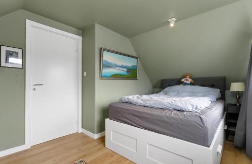 Laugardalur Apartment | Charming Attic Flat with Garden Near Downtown