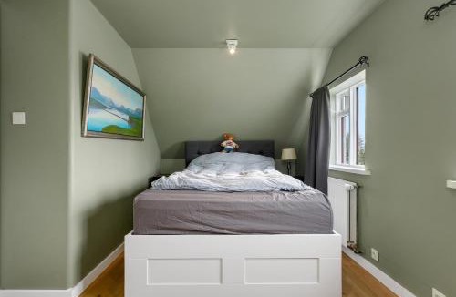 Laugardalur Apartment | Charming Attic Flat with Garden Near Downtown