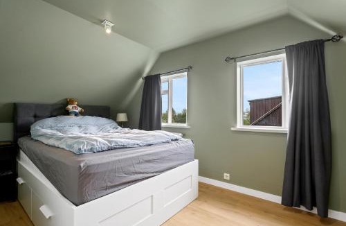 Laugardalur Apartment | Charming Attic Flat with Garden Near Downtown