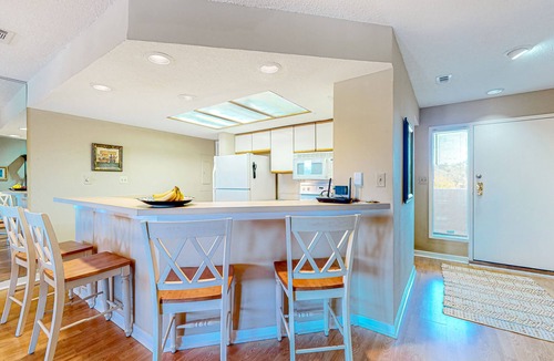 Shelter Cove Villa | Charming bay view villa with pool, washer/dryer, balcony, TV, & full kitchen