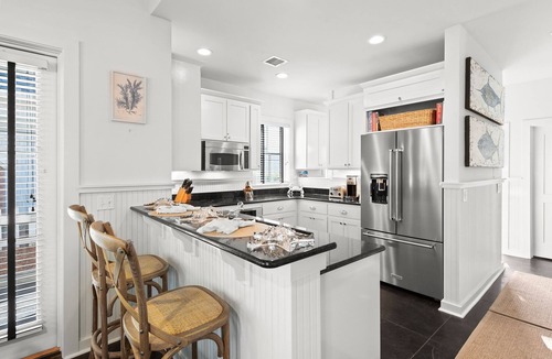 WaterSound Beach House | Charming Beach Bungalow with Golf Cart, Bikes and Screened-in Porch