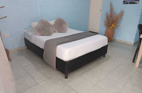 Taganga Bed & Breakfast | Charming bed & breakfast with 6 bedrooms and WiFi, AC in brilliant Taganga