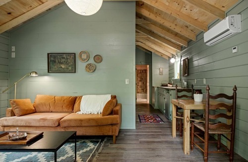 Rocky Grove Cabin | Charming Cabin Rental with Stream Access for Romantic Getaways near Pigeon Forge, Tennessee
