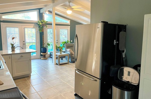 Butler Beach House | Charming Canal Front Cottage! Walk to the Beach!