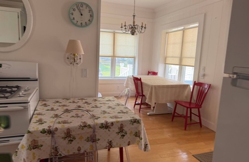 Charlevoix House | Charming Charlevoix Downtown Cottage - Ideal Location with Central Air