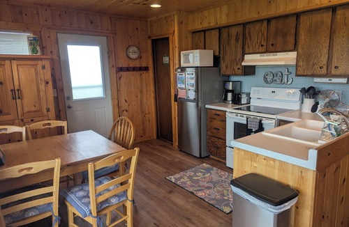 South Haven Cabin | Charming Clean Cabin w/Shared Pool & Incredible Lake Views!