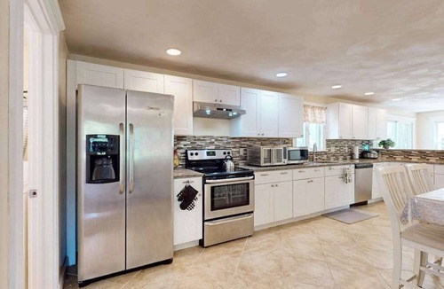 Buzzards Bay House | Charming coastal home with sunny rooms, private backyard, & walk to beach