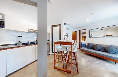 Downtown Cancun Hotel | Charming condo with kitchenette, balcony, & pool