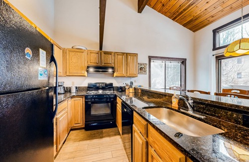 Ketchum Condo | Charming condo with mountain views, fireplace, hot tub & deck