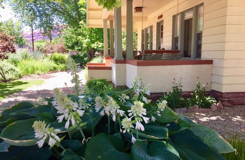 Moab Cottage | Charming cottage off Main Street. Cool summer gardens. Warm winter fireplace
