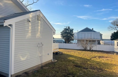 Seconsett Island Cottage | Charming cottage on Seconsett Island, Mashpee with water views of Waquoit bay.