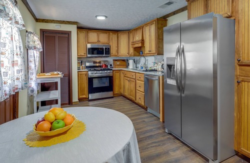 Covington House | Charming Covington Retreat w/ Yard & Sunroom!