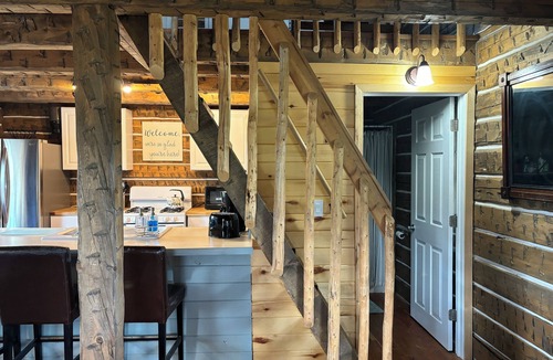 Canon City Cabin | Charming Creekside Cabin next to 4 Mile Creek with mountain views. Dog friendly!