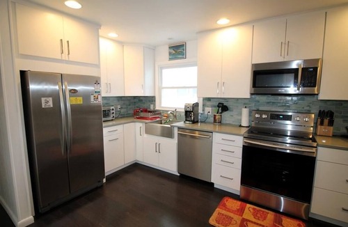 Country Club Estates House | Charming Dog-Friendly Beach Home with In-Law Suite & EV Charging, Walk to Beach!