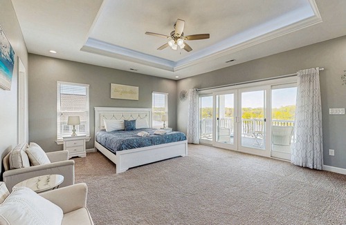 Orange House | Charming dog-friendly lakefront villa with private dock, firepit, stunning views