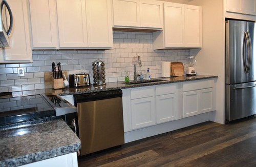 Downtown Louisville Condo | Charming downtown 2-bedroom walkable condo with WiFi, free parking & gym.