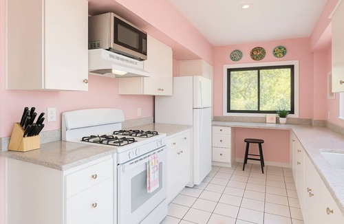 Elysian Heights House | Charming Echo Park bungalow with DTLA views! Steps from Elysian Park & Dodger Stadium, this gallery & artist retreat blends vintage charm with modern comfort. Once home to painter Barbara Romain, now lovingly preserved by Boho House Collective.