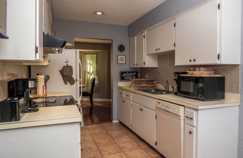 Ringling Park House | Charming Florida bungalow with pool and fenced-in yard.