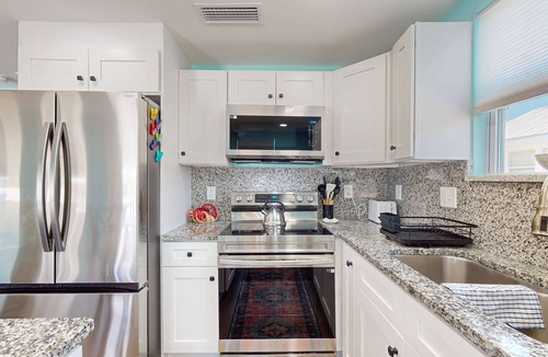 Bradenton Beach Cottage | Charming, fully remodeled cottage steps from beach with WiFi & central AC