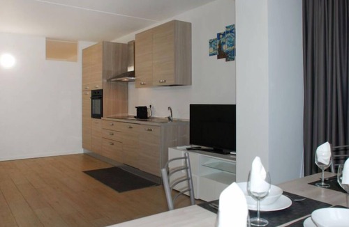 Bissone Apartment | Charming Gardenview App. 105 by Interhome