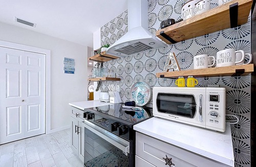 Holmes Beach Cottage | Charming Ground Level Resort Style 3 units Condo of a TRIPLEX- unit A