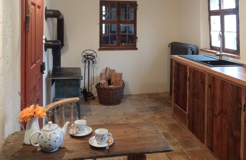 Ickelheim House | Charming Historic Farmhouse on Peaceful Village Edge with Stove & Garden
