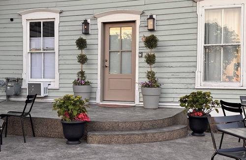 Sturgeon Bay Apartment | Charming historic stay in the heart of Sturgeon Bay! This studio retreat offers a warm and oh-so-cozy four-post bed, walk-in shower, a smart TV, and steps from the waterfront, all the shops and festivals!