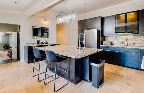 Isles of Capri House | Charming home with inviting patio, W/D, central AC & grill