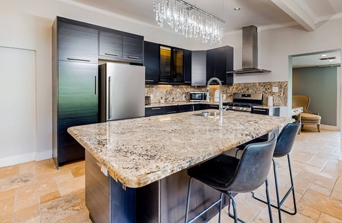Isles of Capri House | Charming home with inviting patio, W/D, central AC & grill