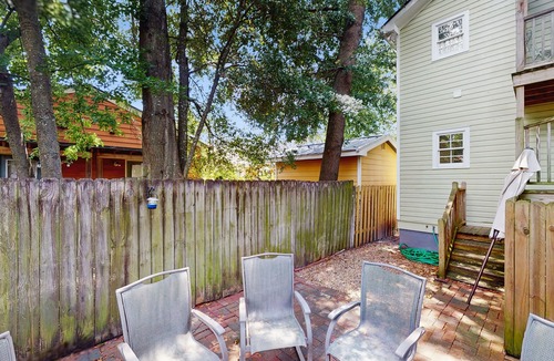 Beach Institute Apartment | Charming home with screened patio, backyard dining & cozy reading nook