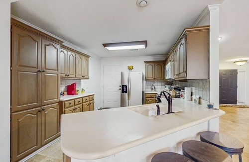 Conway House | Charming House with Cozy Fireplace, Patio, and Washer & Dryer