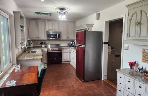 Mount Dora House | Charming lakefront 3BR 3BA house w/EV chg in heart of Mt. Dora. Nature abounds.