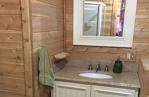 Brownville Cabin | Charming Lakefront Cabin Rental with a Fire Pit near Brownville, Maine
