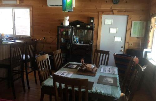 Brownville House | Charming Lakefront Cabin Rental with a Fire Pit near Brownville, Maine