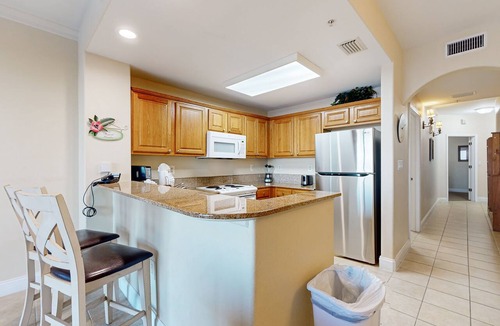 Florida Central Atlantic Coast Condo | Charming lakefront condo with balcony, lake view, AC, Internet, pool & hot tub
