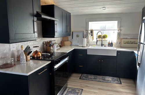 Howe Cottage | Charming Lakefront cottage on Cedar Lake. Beautiful Spa Bathroom, soaking tub