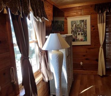 Lake Helen House | Charming Lakefront Room with Private Porch & Canoe Rentals Near Lake Helen, Florida
