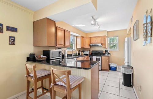 Longbeach Village House | Charming Longboat Village Hideaway–2BR in a Quiet Coastal Neighborhood by RVA