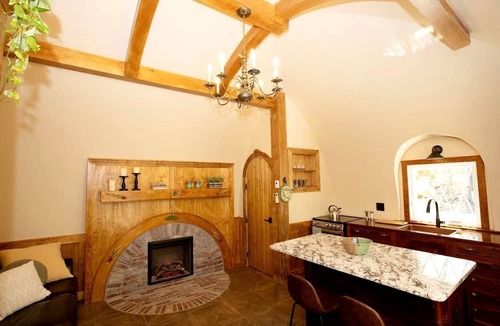 Springvale Cabin | Charming Luxury Hobbit House with Private Hot Tub in Tranquil Woodlands on Littlefield Pond in Springvale, Maine