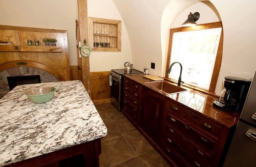 Springvale Cabin | Charming Luxury Hobbit House with Private Hot Tub in Tranquil Woodlands on Littlefield Pond in Springvale, Maine