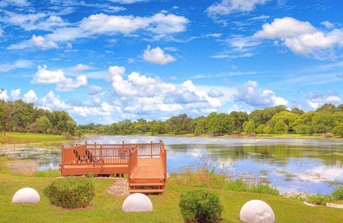 Lake Helen House | Charming Nautical-Themed Inn Room with Private Whirlpool & Lake Views Near Lake Helen, Florida