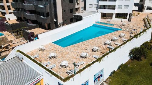 Caioba Apartment | Charming Ocean Front Condominium with Swimming Pool