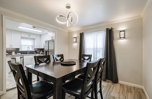 Shady Acres House | Charming private home sleeps 6 in the Heights near Downtown with fast WiFi, smart TVs, ample parking, and a primary king bed for a comfortable stay.